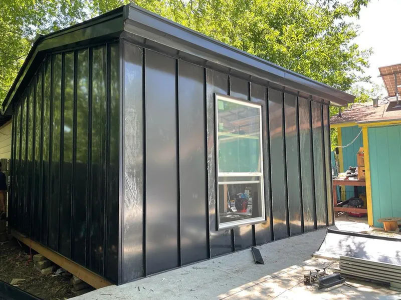 Black standing seam metal wall panels for Metal Roof Installation in Prior Lake